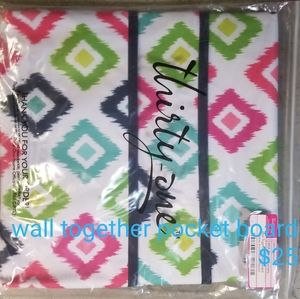 Thirty-one wall together pocket board